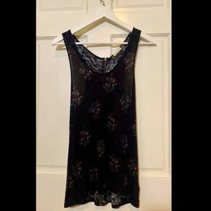 Black, floral Silence + Noise tank with full zipper down back.